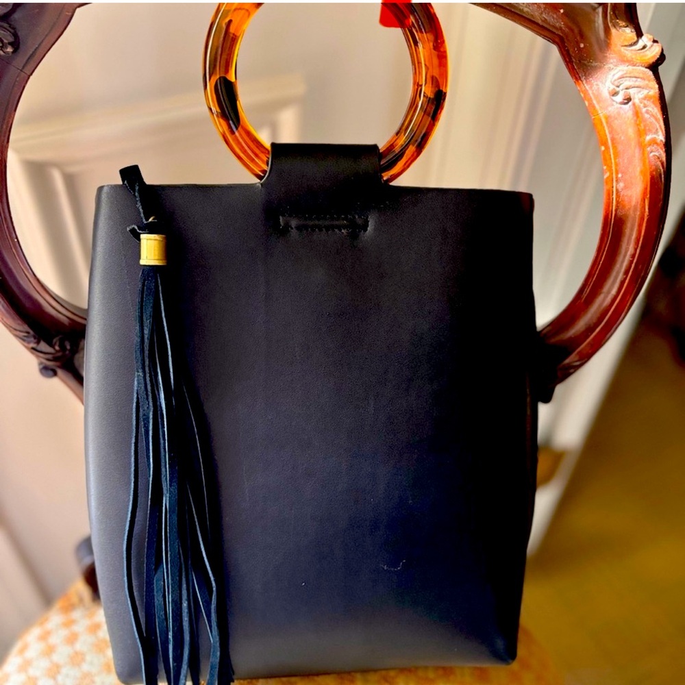 Anthropology Vegan Leather Black bag with Lucite Handle